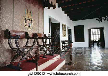 Side view of two antique chairs enclosed in a fence, Old San Juan, Puerto Rico View Large Photo Image Stock Image - Side view of two antique chairs enclosed in a fence, Old San Juan, Puerto Rico. Fotosearch