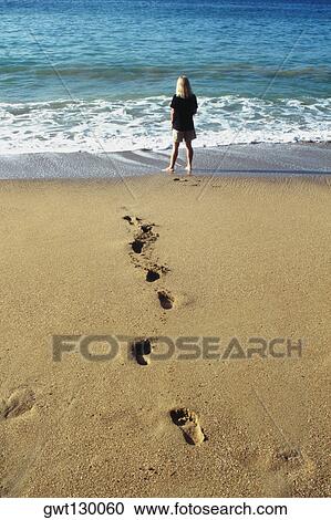 A woman's footprints imprinted on the sand, Pigeon Point Beach, Tobago, Caribbean View Large Photo Image Stock Image - A woman's footprints imprinted on the sand, Pigeon Point Beach, Tobago, Caribbean. Fotosearch