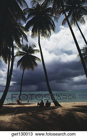 View of a scenic beach on a cloudy day, Pigeon Point, Tobago View Large Photo Image Stock Image - View of a scenic beach on a cloudy day, Pigeon Point, Tobago. Fotosearch