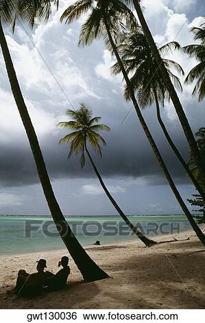 View of a scenic beach on a cloudy day, Pigeon Point, Tobago View Large Photo Image Stock Photograph - View of a scenic beach on a cloudy day, Pigeon Point, Tobago. Fotosearch