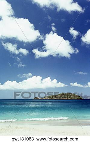 A beach seen under a vast sky, Caneel Bay, St. John, U. S. Virgin Islands View Large Photo Image Stock Image - A beach seen under a vast sky, Caneel Bay, St. John, U. S. Virgin Islands. Fotosearch