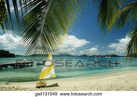 Sailboat on a beach, U. S. Virgin Islands View Large Photo Image Stock Photo - Sailboat on a beach, U. S. Virgin Islands. Fotosearch