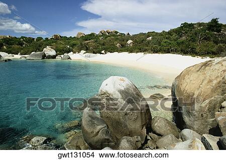 Seashore flanked by rocks, Virgin Gorda, Virgin Islands View Large Photo Image Picture - Seashore flanked by rocks, Virgin Gorda, Virgin Islands. Fotosearch