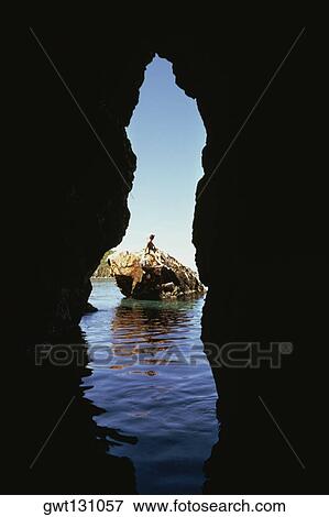 Stock Photo - Silhouette of a cave, Treasure Island, Virgin Islands. Fotosearch