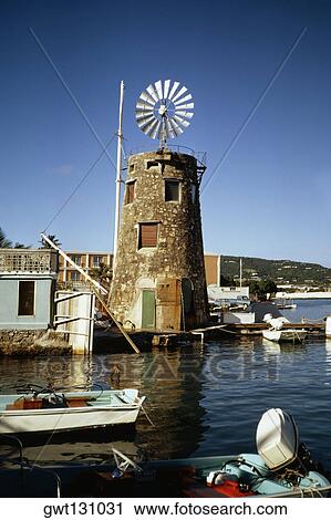 View of a windmill near a harbor, St. Croix, U. S. Virgin Islands View Large Photo Image Stock Image - View of a windmill near a harbor, St. Croix, U. S. Virgin Islands. Fotosearch