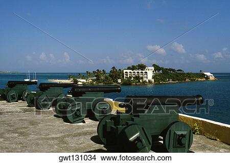 View of cannons with a fort seen in the background, Christiansvaern fort, St. Croix, U. S. Virgin Islands View Large Photo Image Picture - View of cannons with a fort seen in the background, Christiansvaern fort, St. Croix, U. S. Virgin Islands. Fotosearch