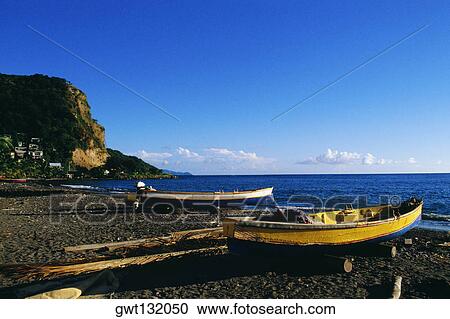 Fishing boats lined up on a seashore, Martinique View Large Photo Image Stock Image - Fishing boats lined up on a seashore, Martinique. Fotosearch