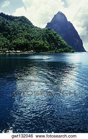 Low angle view of a volcanic mountain from the sea, St. Lucia View Large Photo Image Stock Photograph - Low angle view of a volcanic mountain from the sea, St. Lucia. Fotosearch