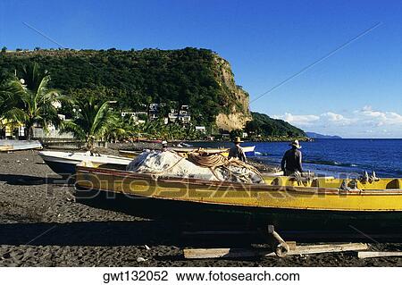 Rear view of fishermen wearing straw hats standing near fishing boats, Martinique View Large Photo Image Stock Image - Rear view of fishermen wearing straw hats standing near fishing boats, Martinique. Fotosearch