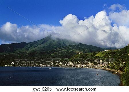 Scenic view of a mountain peak covered with thick clouds, Martinique View Large Photo Image Stock Image - Scenic view of a mountain peak covered with thick clouds, Martinique. Fotosearch
