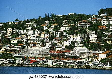 View of a city with a cluster of houses View Large Photo Image Stock Photo - View of a city with a cluster of houses. Fotosearch