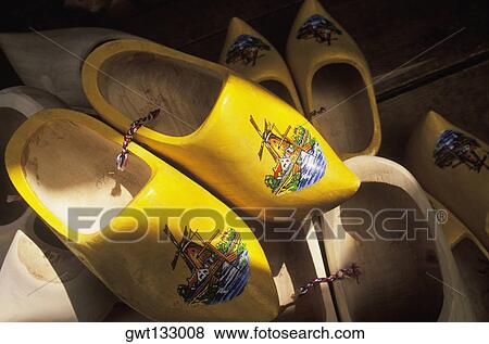 Stock Photo - Close-up of a pair of yellow clogs, Amsterdam, Netherlands. Fotosearch