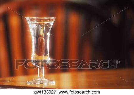Glass of tequila on the table, Amsterdam, Netherlands View Large Photo Image Stock Photo - Glass of tequila on the table, Amsterdam, Netherlands. Fotosearch