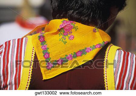 Rear view of a person in traditional clothing View Large Photo Image Stock Image - Rear view of a person in traditional clothing. Fotosearch