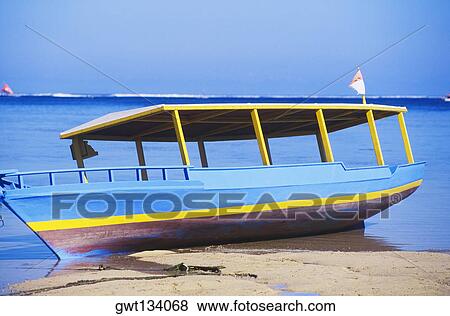 Boat at the coat, Bali, Indonesia View Large Photo Image Stock Photo - Boat at the coat, Bali, Indonesia. Fotosearch