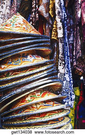 Close-up of a stack of Asian style conical hats in a store, Bali, Indonesia View Large Photo Image Stock Photo - Close-up of a stack of Asian style conical hats in a store, Bali, Indonesia. Fotosearch