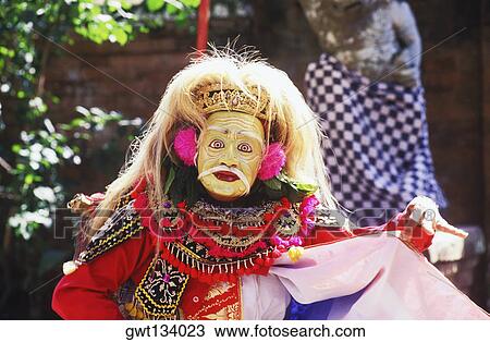 Stock Image - Close-up of a stage performer dancing, Bali, Indonesia. Fotosearch
