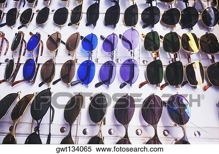 Close-up of sunglasses displayed in a store, Bali, Indonesia View Large Photo Image Stock Photography - Close-up of sunglasses displayed in a store, Bali, Indonesia. Fotosearch