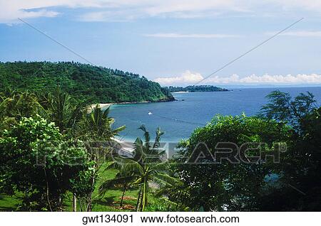 Stock Image - Panoramic view of the beach, Bali, Indonesia. Fotosearch