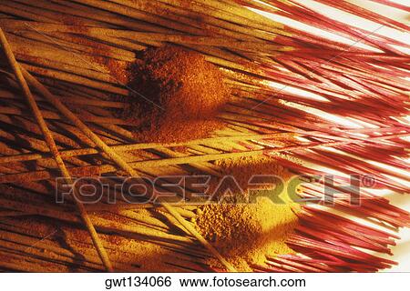 Powder on incense sticks View Large Photo Image Stock Photograph - Powder on incense sticks. Fotosearch