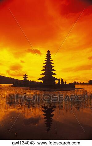 Reflection of a temple in water, Pura Ulu Danau Temple, Bali, Indonesia View Large Photo Image Stock Image - Reflection of a temple in water, Pura Ulu Danau Temple, Bali, Indonesia. Fotosearch