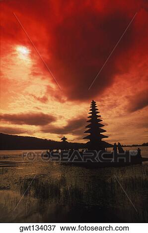 Silhouette of a temple in a lake, Puru Ulu Danau Temple, Bali, Indonesia View Large Photo Image Stock Photo - Silhouette of a temple in a lake, Puru Ulu Danau Temple, Bali, Indonesia. Fotosearch