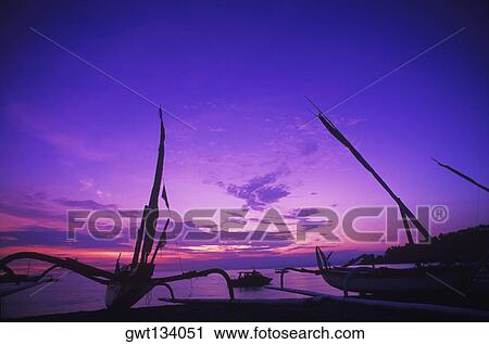 Silhouette of boats at dusk, Bali, Indonesia View Large Photo Image Stock Image - Silhouette of boats at dusk, Bali, Indonesia. Fotosearch