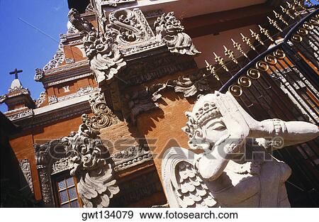Statues in a temple, Bali, Indonesia View Large Photo Image Stock Photo - Statues in a temple, Bali, Indonesia. Fotosearch