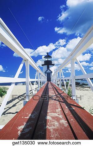 Boardwalk leading to a lighthouse, Cape Cod, Massachusetts, USA View Large Photo Image Stock Image - Boardwalk leading to a lighthouse, Cape Cod, Massachusetts, USA . Fotosearch