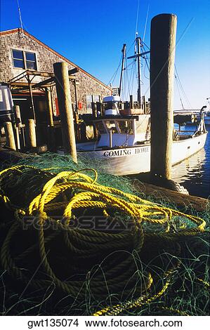 Picture - Boat moored at a dock, Cape Cod, Massachusetts, USA . Fotosearch
