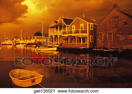 Stock Image - Boats moored in a river, Cape Cod, Massachusetts, USA . Fotosearch