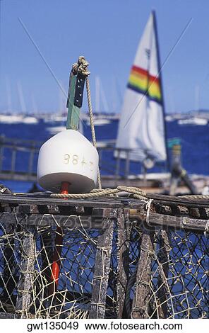 Close-up of a fishing bobber on a lobster trap View Large Photo Image Stock Photo - Close-up of a fishing bobber on a lobster trap. Fotosearch