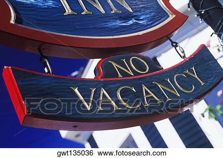 Stock Photograph - Close-up of a no vacancy sign board. Fotosearch