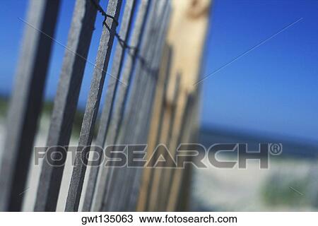 Stock Image - Close-up of a wooden fence. Fotosearch