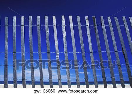 Close-up of wooden fence on the beach, Cape Cod, Massachusetts, USA View Large Photo Image Stock Image - Close-up of wooden fence on the beach, Cape Cod, Massachusetts, USA . Fotosearch