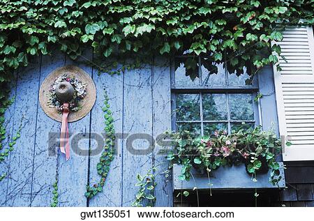 Hat hanging on the door View Large Photo Image Stock Image - Hat hanging on the door. Fotosearch