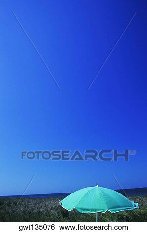 High section view of a beach umbrella View Large Photo Image Stock Photograph - High section view of a beach umbrella. Fotosearch