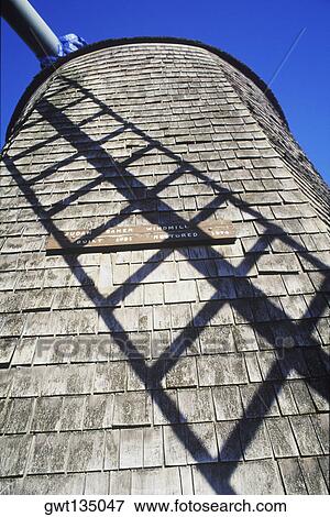 Low angle view of a traditional windmill, Cape Cod, Massachusetts, USA View Large Photo Image Stock Photo - Low angle view of a traditional windmill, Cape Cod, Massachusetts, USA . Fotosearch