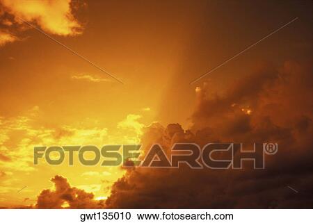 Low angle view of storm clouds in the sky View Large Photo Image Stock Image - Low angle view of storm clouds in the sky. Fotosearch