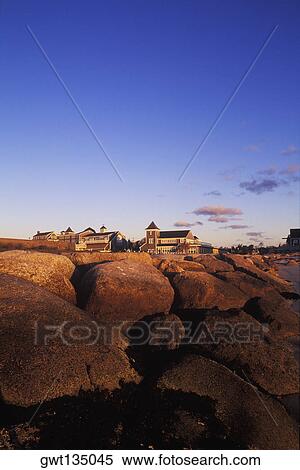 Rocks in front of buildings, Cape Cod, Massachusetts, USA View Large Photo Image Stock Photography - Rocks in front of buildings, Cape Cod, Massachusetts, USA . Fotosearch