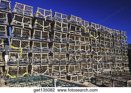 Stock Image - Stack of lobster traps. Fotosearch