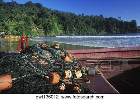 Close-up of a fishing net in a fishing boat View Large Photo Image Stock Image - Close-up of a fishing net in a fishing boat. Fotosearch