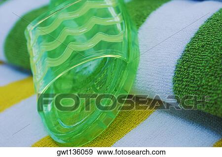 Close-up of a slipper on towels View Large Photo Image Stock Photo - Close-up of a slipper on towels. Fotosearch