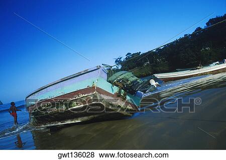 Fishing boat on the beach, Caribbean View Large Photo Image Stock Photo - Fishing boat on the beach, Caribbean. Fotosearch