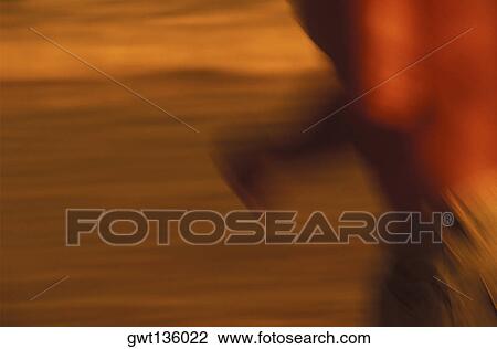 Mid section view of a person jogging on the beach, Caribbean View Large Photo Image Stock Image - Mid section view of a person jogging on the beach, Caribbean. Fotosearch