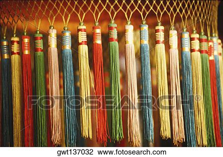 Close-up of tassels hanging from a lantern View Large Photo Image Stock Image - Close-up of tassels hanging from a lantern. Fotosearch