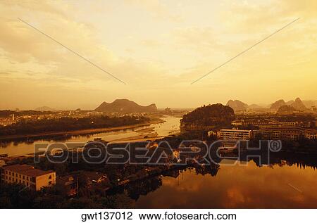 High angle view of buildings along a river, China View Large Photo Image Stock Image - High angle view of buildings along a river, China. Fotosearch