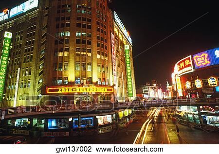 Low angle view of a building lit up at night, China View Large Photo Image Stock Image - Low angle view of a building lit up at night, China. Fotosearch