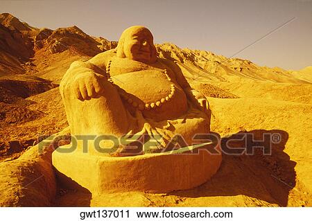 Low angle view of a sculpture of Buddha, China View Large Photo Image Stock Image - Low angle view of a sculpture of Buddha, China. Fotosearch