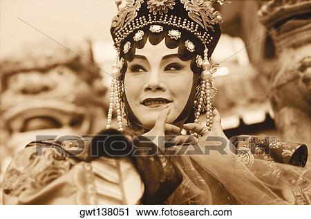 Stock Image - Close-up of a female opera performer, Hong Kong, China. Fotosearch